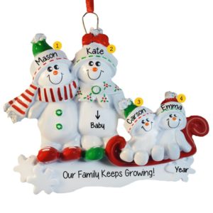 Image of Expecting Snow Couple With Two Kids On Sled Ornament