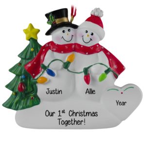 Image of Our 1st Christmas Snow Couple Holding Lights Ornament