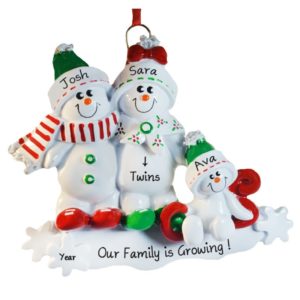 Image of Expecting Twins Snow Couple With Child On Sled Ornament