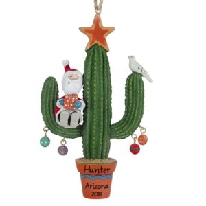 Image of Santa Sitting On Festive Saguaro Cactus Ornament