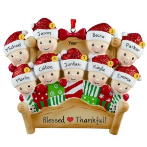 Image of Nine Grandkids In Christmas Bed Personalized Ornament