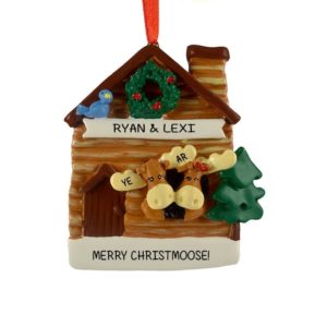 Image of Moose Couple In Cabin With Blue Bird Ornament