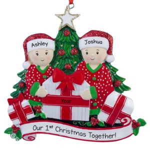 Image of Couple's 1st Christmas Together Opening Presents By Tree Ornament