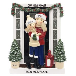 Image of Personalized Couple In Front Of Festive Home Ornament