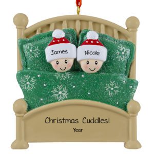 Image of Personalized Happy Couple Cuddling In Glittered Green Bed Ornament